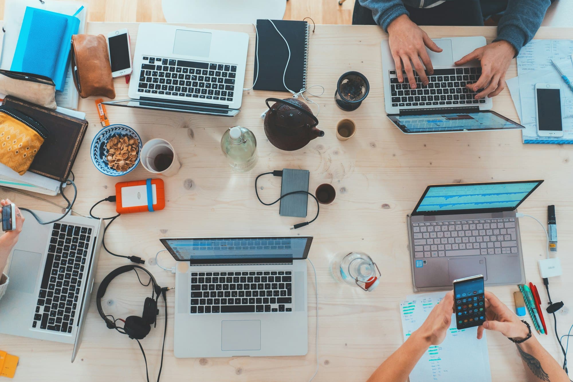 Engineers working together at a shared desk